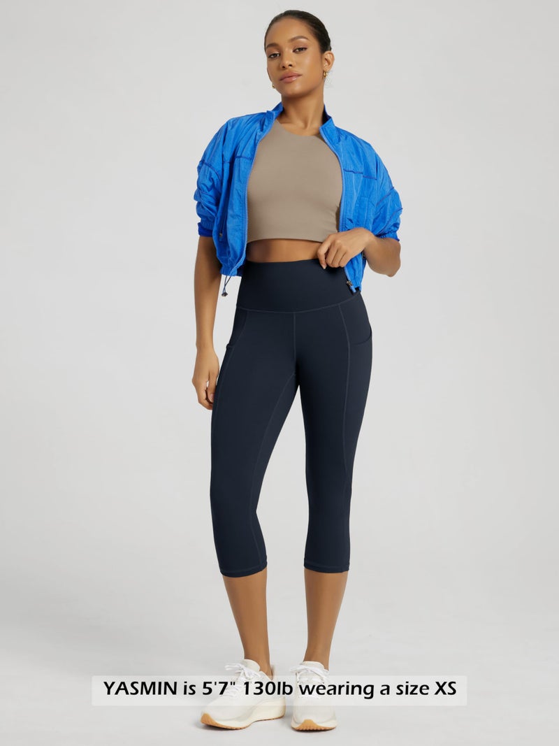 ODODOS Women's High Waisted Yoga Capris with Pockets,Tummy Control Non See Through Workout Sports Running Capri Leggings, Deep Navy,X-Large - Image 4